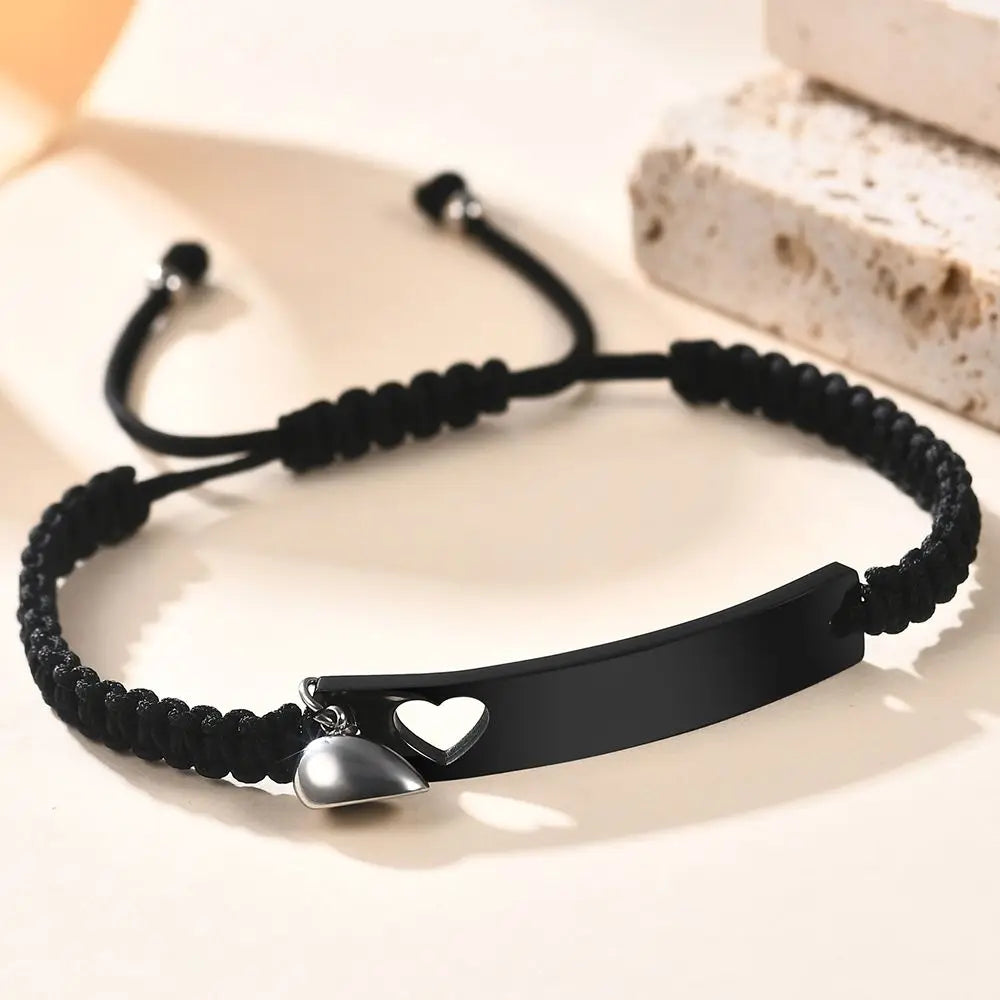 Personalisietes Edelstahl-Paararmband als Set, schwarz gewebt mit Herz-Magnetverschluss