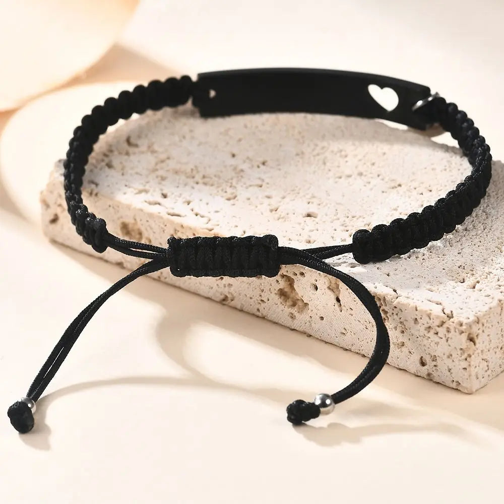 Personalisietes Edelstahl-Paararmband als Set, schwarz gewebt mit Herz-Magnetverschluss