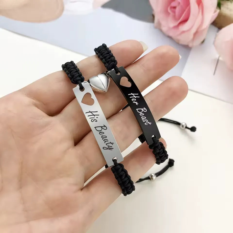 Personalisietes Edelstahl-Paararmband als Set, schwarz gewebt mit Herz-Magnetverschluss